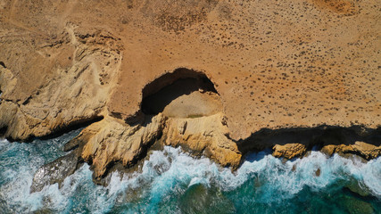 Aerial drone photo of volcanic formations of Gala rocky seascape in Pano Koufonisi island, Small Cyclades, Greece