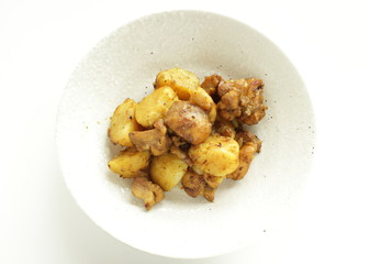 Potato and chicken stir fried with curry 