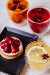 Strawberry tasty tart served with herbal teas and fruits