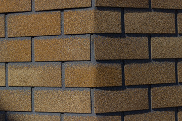 Close-up flexible soft bitumen tile Shinglas. Construction Landscaping