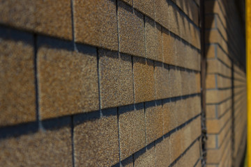 Close-up flexible soft bitumen tile Shinglas. Construction Landscaping