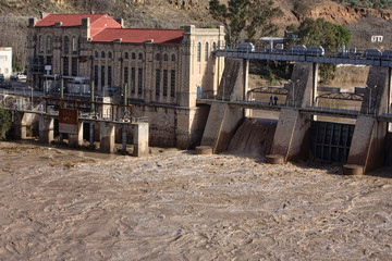 Hydroelectric power station in Mengibar releasing water after heavy rains of winter, in the province of Jaen, Spain