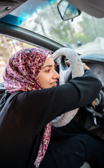 Arabic muslim woman driving