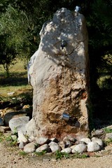an unusual fountain in stone