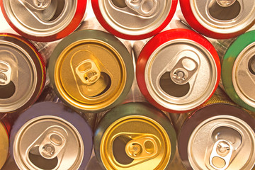 Beer cans as background – top view