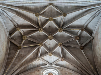 The gothic vault of Chapel Our Lady of Rosary in Cathedral of Our Lady of Assumption with the neoclassicistic frescoes, take in Segovia, Spain