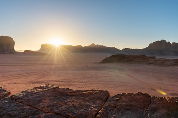 Wadi Rum desert landscape in Jordan, with sunset and clear sky