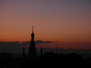 silhouette of church at sunset