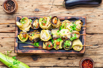 Eggplant with meat on skewers