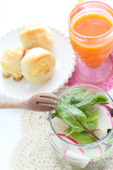 baby spinach and radish salad served with bread