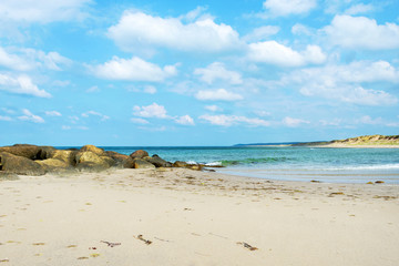 Fototapeta na wymiar Beautiful seascape with sandy beach and beautiful cloudy sky. Nature. Relaxation.
