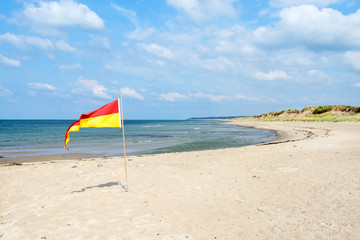 Beautiful seascape with sandy beach and beautiful cloudy sky. Nature. Relaxation.