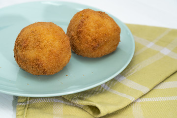 Sicilian Arancino or Arancina. A typical Sicilian street food.