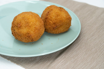 Sicilian Arancino or Arancina. A typical Sicilian street food.