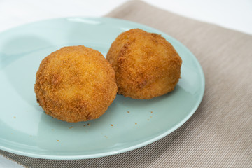 Sicilian Arancino or Arancina. A typical Sicilian street food.