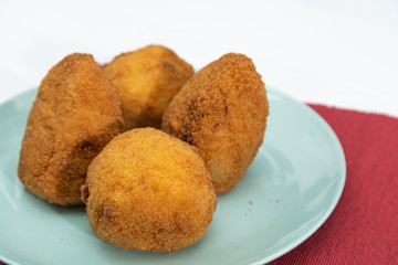 Sicilian Arancino or Arancina. A typical Sicilian street food.