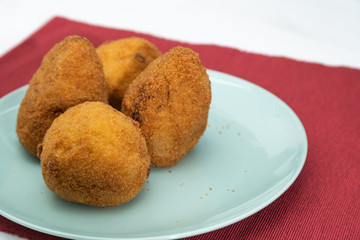 Sicilian Arancino or Arancina. A typical Sicilian street food.