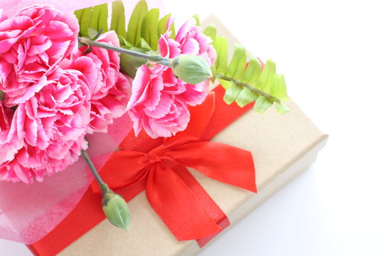 gift box and carnation for Mother's Day image