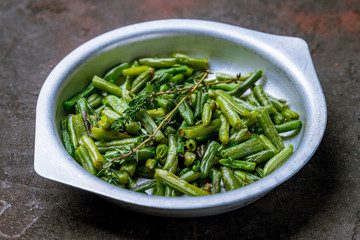 Fried green beans on dark concrete rustic table