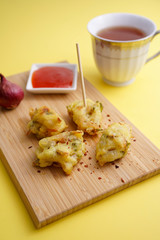 Close up of a crunchy Cucur Ikan Bilis or Anchovies Fritters a Malay traditional evening dish
