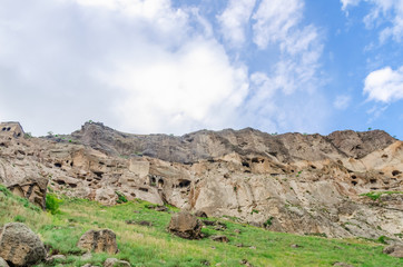 View of the Vardzia caves against the sky with clouds. Vardzia is a cave monastery in southern Georgia