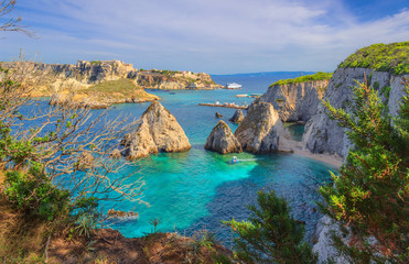 Seascape of Tremiti archipelago with Pagliai cliffs in San Domino island, Cretaccio and San Nicola island in background. - obrazy, fototapety, plakaty