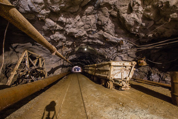 Gold ore mine shaft tunnel underground minecart