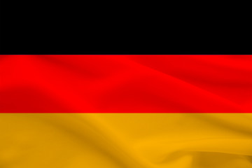 national flag of the country Germany on gentle silk with wind folds, travel concept, immigration, politics, copy space, close-up