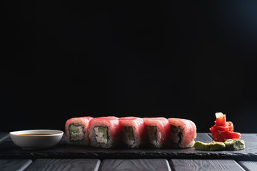 Sushi roll. Sushi at black background.Japanese seafood sushi , sushi a black background.