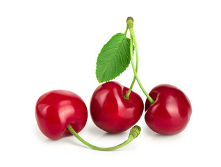 Sweet red cherries with leaves isolated on white background macro