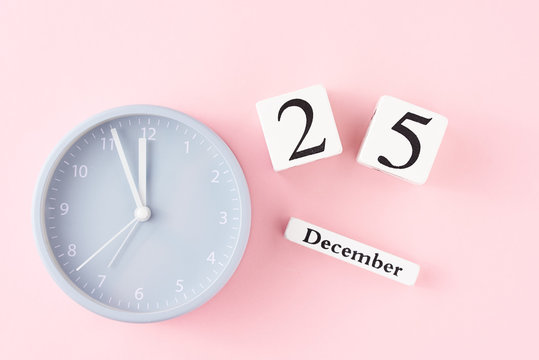 Christmas background with alarm clock on pink background - Powered by Adobe
