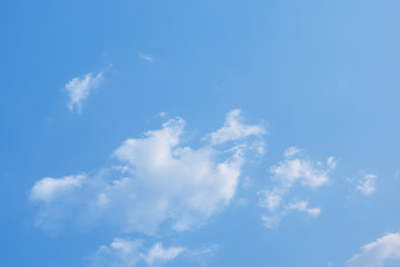 Fantastic soft white clouds against blue sky background soft focus