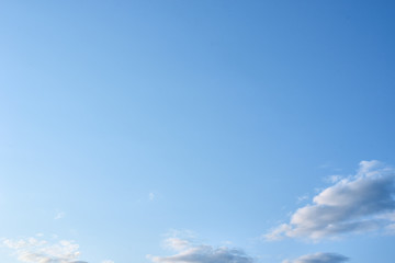 Blue sky with a white clouds, abstract background