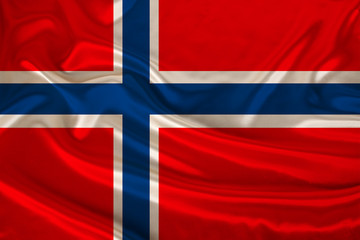 Obraz premium photo of the national flag of Norway on a luxurious texture of satin, silk with waves, folds and highlights, close-up, copy space, travel concept, economy and state policy, illustration