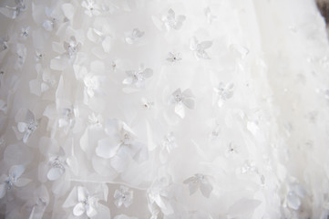 Flower details on woman wedding dress