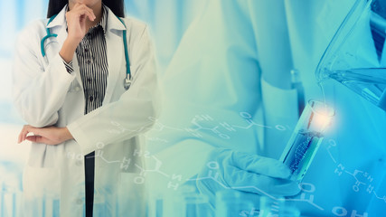 Professional physician with scientist or chemist researcher doing dna extraction, science experiment for beauty supplements at laboratory. Healthcare, medical,pharmaceutical and development concept.