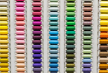 Sale of threads for sewing. Large selection of colors. Atelier, handwork, fabric and sewing...