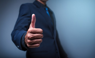 Businessman showing thumbs up - closeup shot - Image