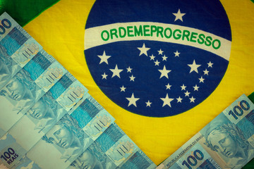 Brazilian money, 100 reais banknote with the National flag