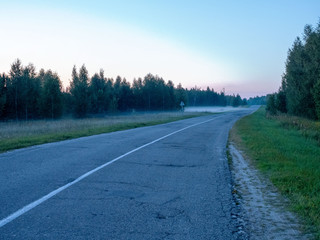 Evening fog along the road.