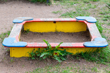 empty old abandoned children's sandbox © Sonya