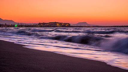 Fototapeta na wymiar Sunset on the beach of Rethymnon city, Greece, Crete