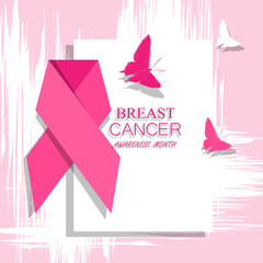 Breast cancer awareness pink ribbon on abstract background.