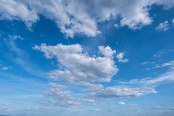 White Clouds In the Blue Sky. Natural background with Clouds