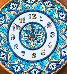 Ceramic blue clock marking the time