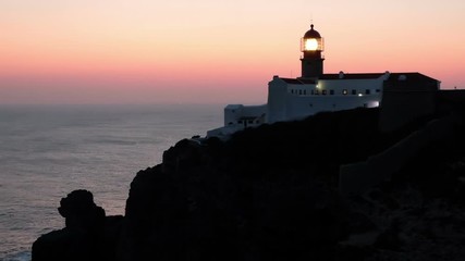 Lighthouse Cabo Vicente in Sagres Portugal at sunset
