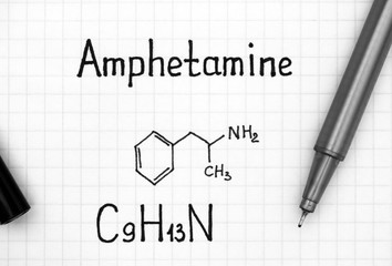 Chemical formula of Amphetamine with black pen.