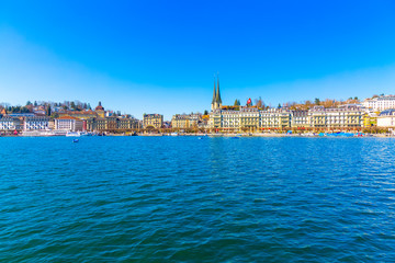 View from Lake Lucerne to Lucerne old town buildings, Switzerland