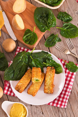 Potato croquettes with spinach and mozzarella.