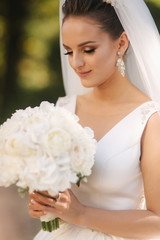 Closeup of wedding bouquet in brides hands